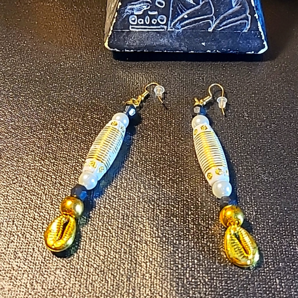Bohemian  style cowrie shells long tube gold/white dangle earrings.